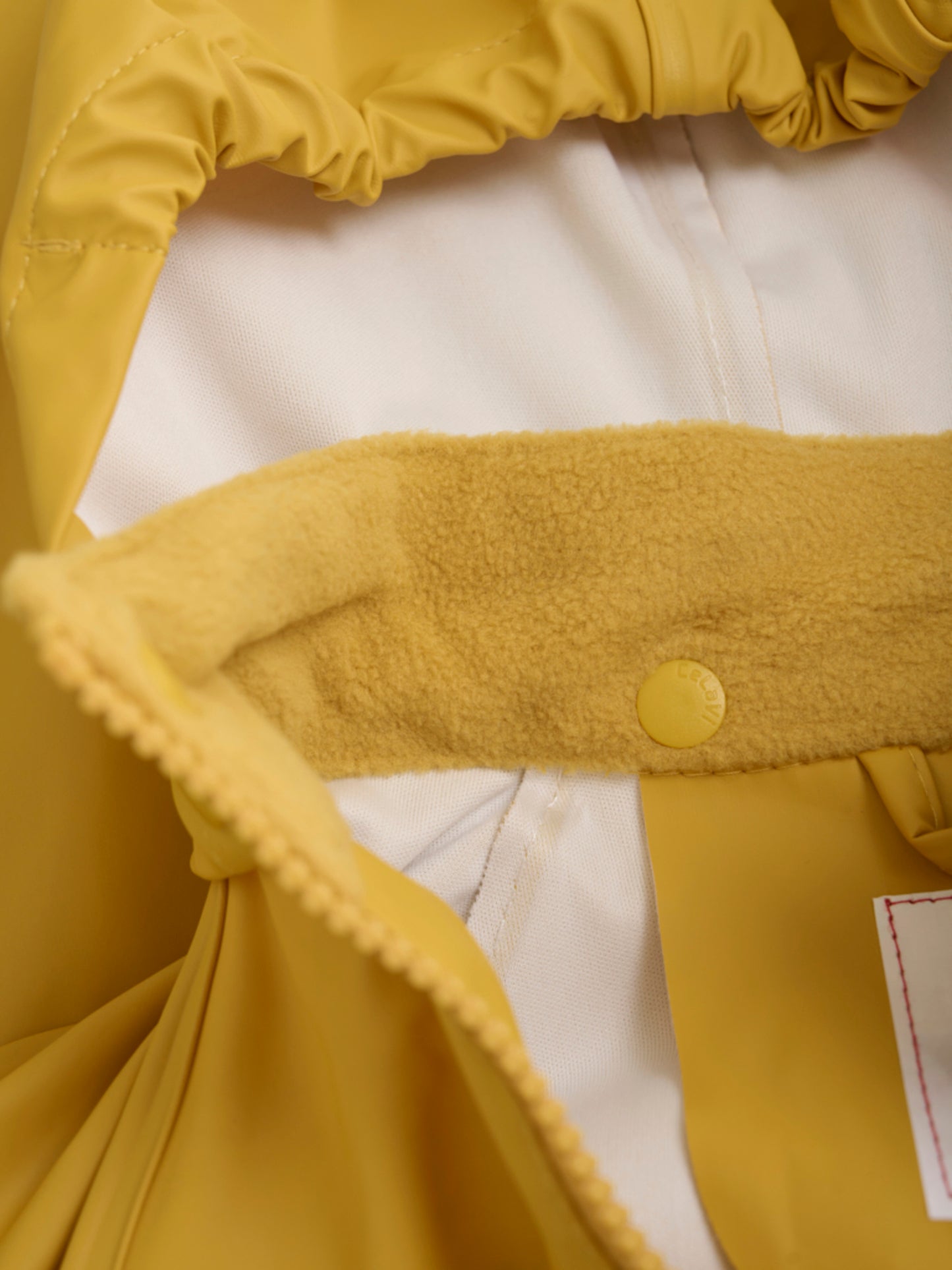 CeLaVi regenpak oker geel maat